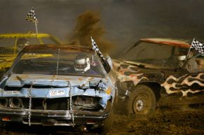 Don Clobes Jr. gets hit on both sides of his car at the Ventura County Fair Demolition Derby.