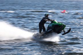 Snowmobile watercross is a risky sport — it’s even banned in some U.S. states.