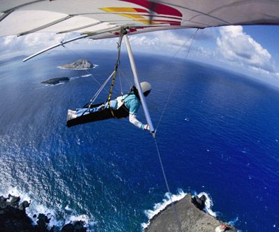 hang-gliding over the ocean