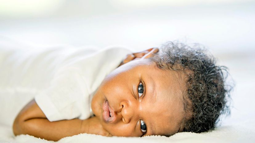 newborn baby with blue eyes