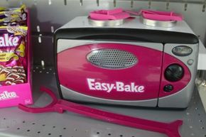 Many adults harbor fond memories of creating small-scale homemade baked goods in a toy oven similar to this one. 
