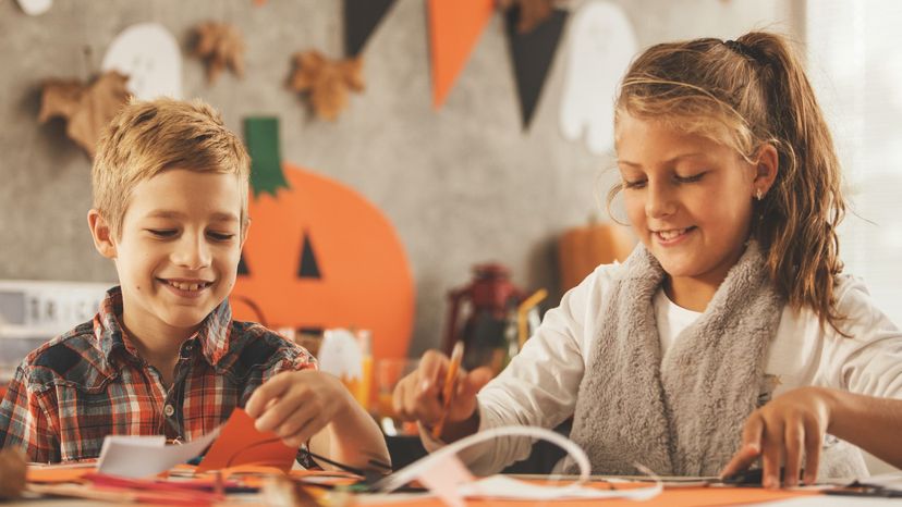 Kids doing Halloween crafts