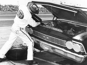 Smokey Yunick, pictured here at the 1967 Daytona 500, really knew his way around under the hood of a car.