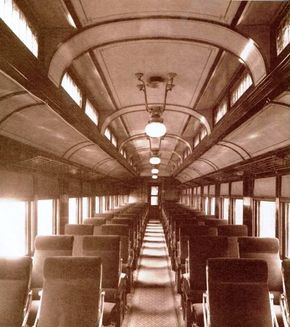 This unidentified railroad day coach of 1913 was stylish and up-to-date with reclining walkover seats, carpeting, separate waterclosets, and gas lighting.