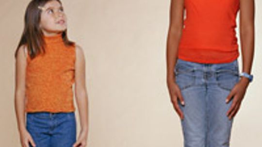 Why is puberty coming earlier for girls today?