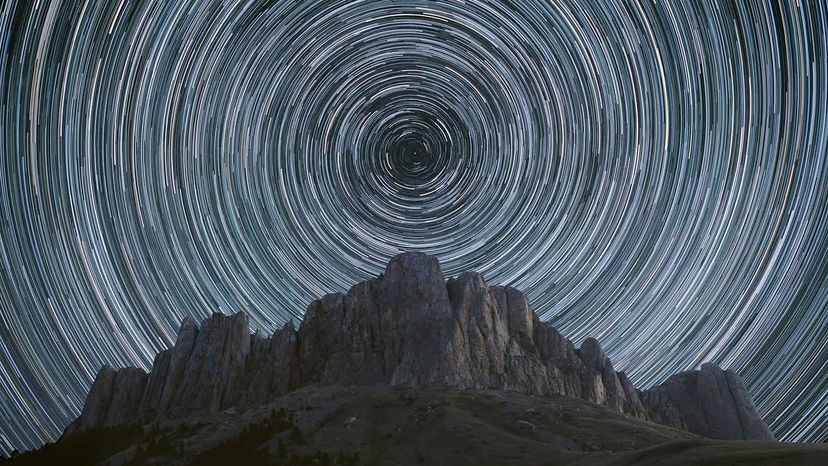 star trails over the rocky mountains