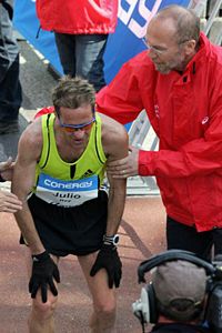 An exhausted Julio Rey finishes the Hamburg Conergy Marathon in Germany on April 27, 2008.