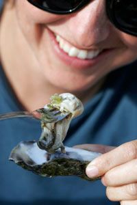 woman eating an oyster