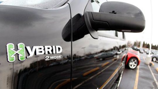 What is the economic impact of hybrid cars?