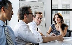 Workers in business meeting. 