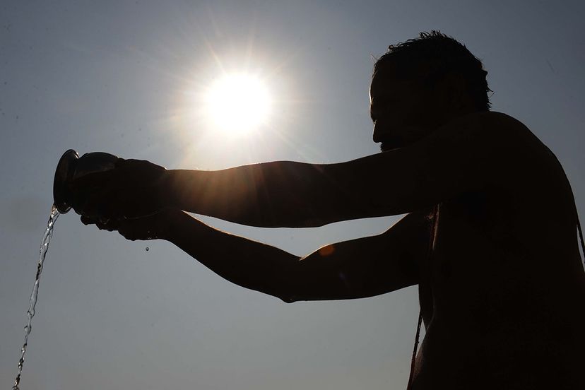 solar eclipse, india, water ceremony