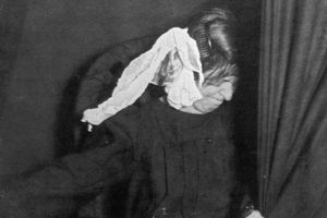 Ectoplasm next to a woman's head