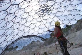 Workers finishing Eden's largest dome, in June 2000
