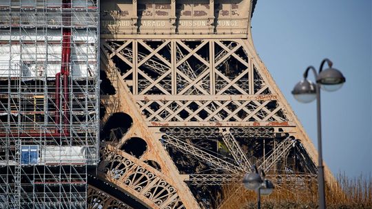 The Rusting Eiffel Tower Gets a Paint Job; Critics Say Much More Is Needed