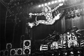 Spandex: Friend to rock stars everywhere. David Lee Roth shows off his stretchy duds while playing with Van Halen at a 1981 Philadelphia show.