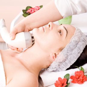 Woman receiving electrolysis at spa.