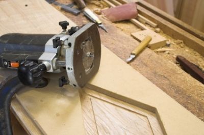 plunge router and guide on a diamond-shaped jig
