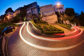 San Francisco's Lombard Street at dusk is beautiful (and crooked and steep). It could also be rather problematic for cars with less than optimal power.
