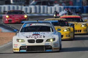 Andy Priaulx drives the #90 BMW Rahal Letterman Racing BMW M3 GT2 during the ALMS 12 Hours of Sebring at Sebring International Raceway on March 20, 2010 in Sebring, Florida.