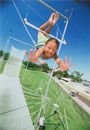 Girl swinging on trapeze