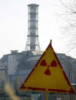 A sign warns of nuclear radiation at the site of the Chernobyl nuclear disaster.