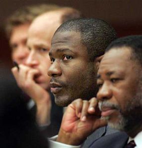 Accused courthouse gunman Brian Nichols listens to testimony from the defense table on March 29, 2006, at the Fulton County Courthouse in Atlanta, Georgia.