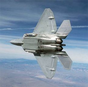 This F/A-22 is carrying two AIM-9M Sidewinder missiles in its side weapons bays.