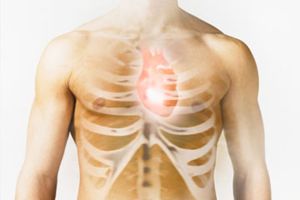 Man with heart and ribs image over chest, close-up (Digital Composite)