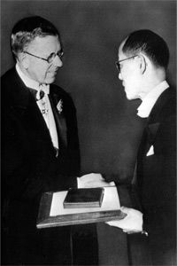 ­Dr. Hideki Yukawa, right, receives the Nobel Prize for physics in Stockholm from then Crown Prince Gustaf Adolf of Sweden Dec. 10, 1949, for his postulation on the meson.