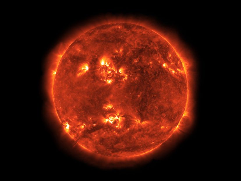 A coronal mass ejection could cause large-scale power outages and starvation. © NASA/Bryan Allen/Corbis