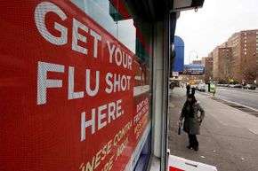 A sign advertises flu shots at a Manhattan pharmacy during the 2013 flu epidemic. Despite media reports to the contrary, flu shots were readily available.