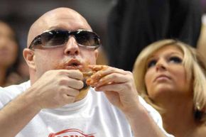 Rick Russo of Trappe, Penn., chows down on Buffalo wings during Wing Bowl 17 in Philadelphia. Wing Bowl, a competitive eating contest held Super Bowl weekend, was started by a local DJ who was tired of the Eagles never making it to the big game.