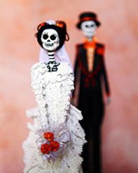 Try taking photos of traditional Day of the Dead artwork, like the Mexican wedding figurines shown here.