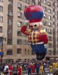 Macy's Thanksgiving Day Parade draws                                  thousands to New York City.