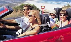 Family riding in convertible