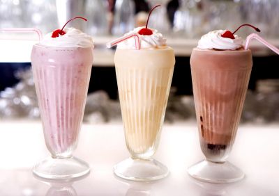strawberry, vanilla and chocolate milkshakes