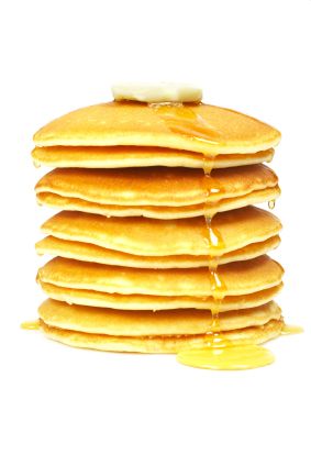 stack of pancakes with butter and syrup