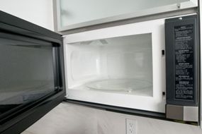 open door of microwave oven