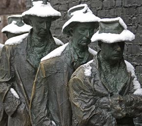 The sorrowful faces of the life-size statues are a powerful expression of the times, showing the inactivity and troubles of everyday citizens during the Great Depression.