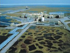 Oil drilling creates a pretty imposing footprint on the surrounding environment, as you can see here in Prudhoe Bay, Alaska.