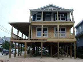 This older home in Wrightsvile Beach, NC, a Project Impact Community, is being elevated to provide protection from a hurricane storm surge.“border=