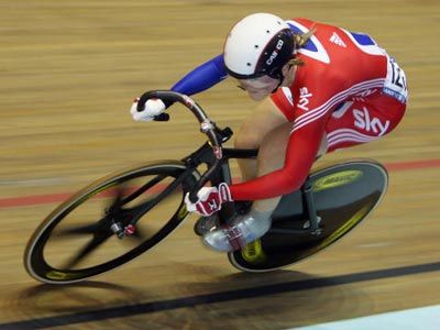 Cyclists racing for speed in sporty competition.