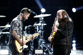 Judge Adam Levine and contestant Laith Al-Saadi jam on &quot;The Voice.&quot; Al-Saadi said he was glad he didn't win because the winner is locked into a contract where the show owns all intellectual property, rights and merchandising.