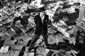 Orson Welles wrote, directed and starred in 'Citizen Kane' -- and pioneered a time-distorted narrative as well as the use of lighting to capture mood.