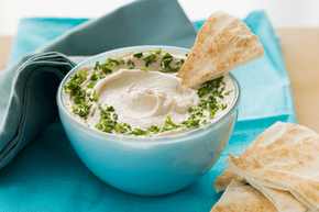 Delicious and healthy hummus dip is a great alternative to cheesy, mayonnaise-rich holiday dips.