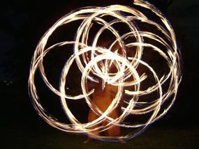 Spinning poi requires strength, flexibilityand centrifugal force.