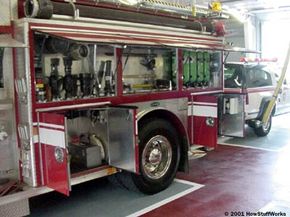 A fire engine carries dozens of tools and supplies in its compartments, including forceful-entry tools, nozzles and hydrant connection adapters.