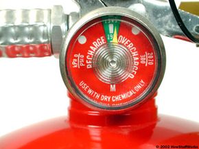 Most dry-chemical fire extinguishers have a built-in pressure gauge. If the gauge indicator is pointing to &quot;recharge,&quot; the pressure in the extinguisher may be too low to expel the contents. The National Fire Protection Association recommends having dry extinguishers inspected every six years, even if the gauge indicates correct pressure.