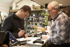 man doing background check for gun