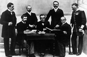The first Olympic committee, shown on June 1, 1896. Seated L to R: Baron de Coubertin (France), Demetrius Vikelas (Greece), A. de Boulovsky (Russia). Standing L to R: Dr. W. Gebhardt (Germany), Jiri Guth-Jarkovsky (Czechoslovakia), Francois Kemeny (Hungary) and General Victor Balck (Sweden)